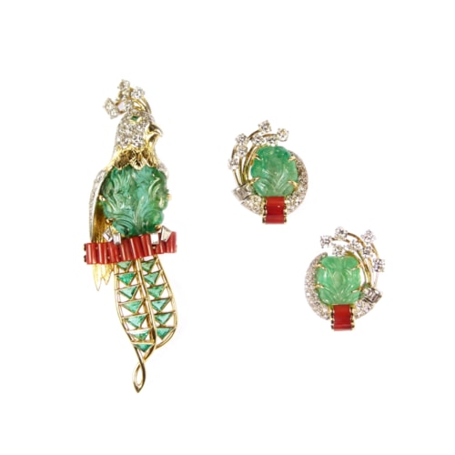 Carved emerald, diamond and corallium rubrum exotic bird brooch and earrings en suite